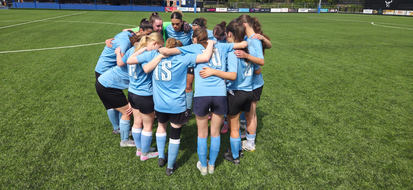 Rugby Town Women FC team huddle
