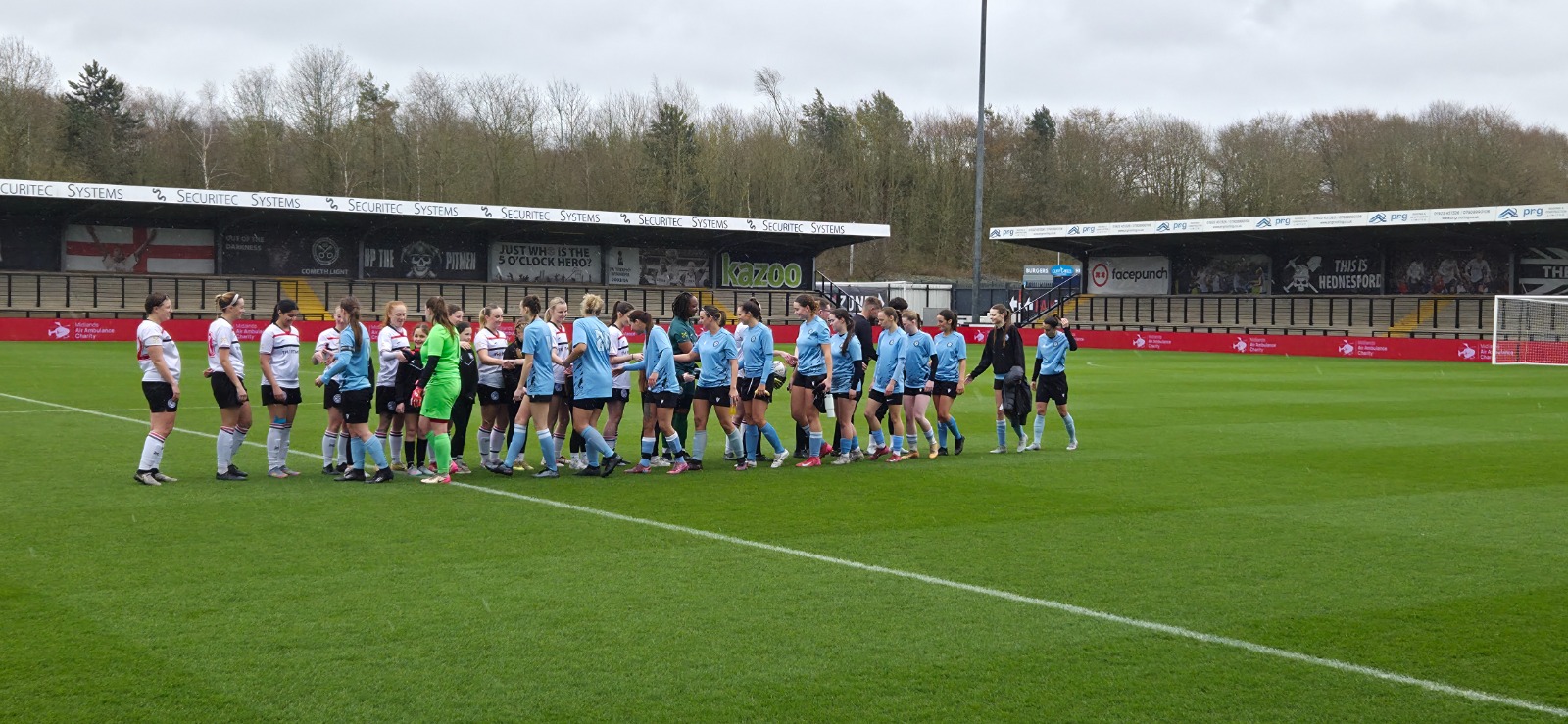 Rugby Town Women FC pre-match handshake at Hednesford Town